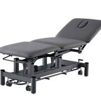 Stealth 3 section examination tables in black with surround bar foot switch