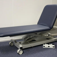 All Electric Medical Couch with electric lock wheels, electric back rest and height adjustment.