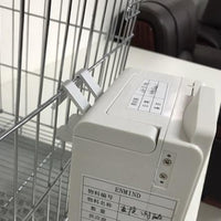 Enmind V3 infusion pump with cage mounting bracket.
